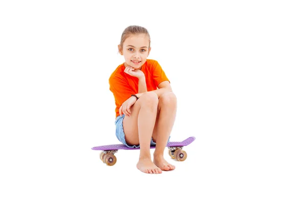 Girl with skateboard isolated on white background — Stock Photo, Image