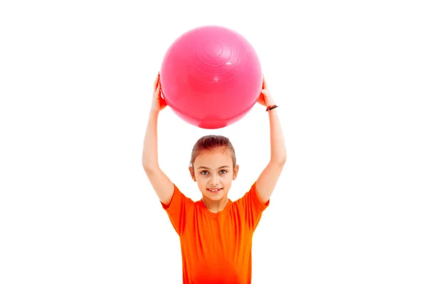 Fitness girl holding pilates ball. — Stock Photo, Image