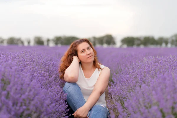 Pensive Woman Sitting Lavender Field Enjoying Sight Smell — Stock Photo, Image