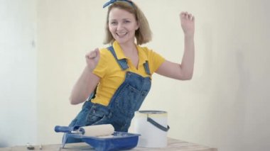 Young woman makes repairs