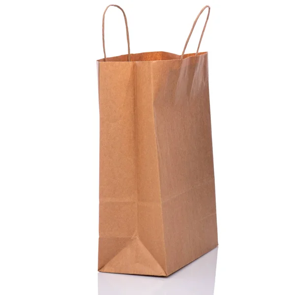 一个空的棕色纸袋 在白色背景查出的回收纸购物袋 — 图库照片