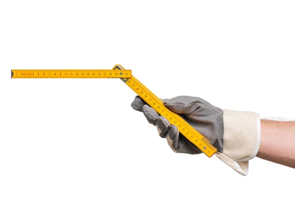Hand with glove and wooden meter — Stock Photo, Image