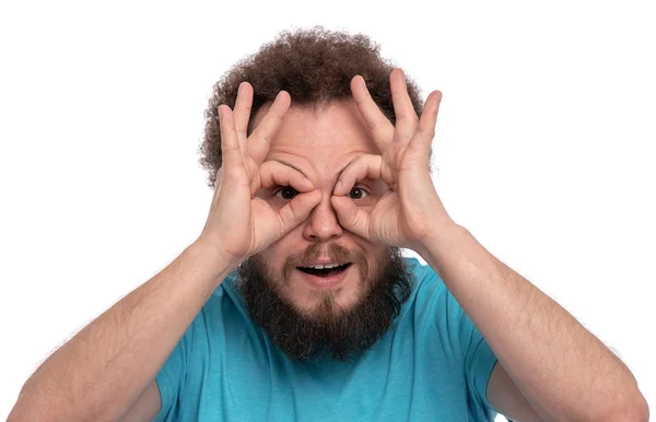 Божевільний бородатий чоловік емоції і ознаки — стокове фото
