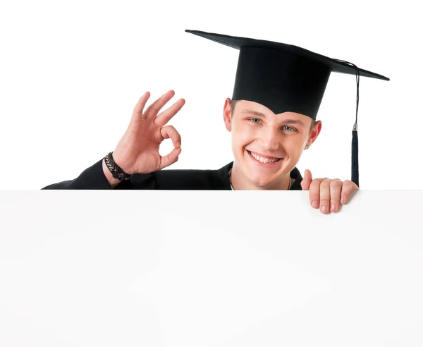 Graduado adolescente chico con tablero en blanco — Foto de Stock