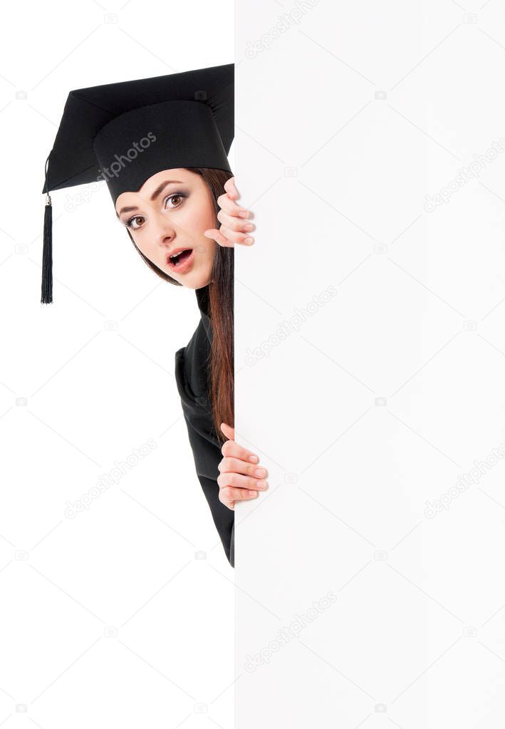Graduate teen girl with blank board