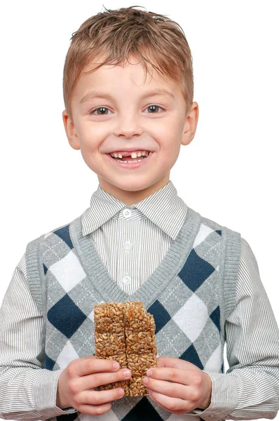 Kleine jongen eten Kozinaki — Stockfoto