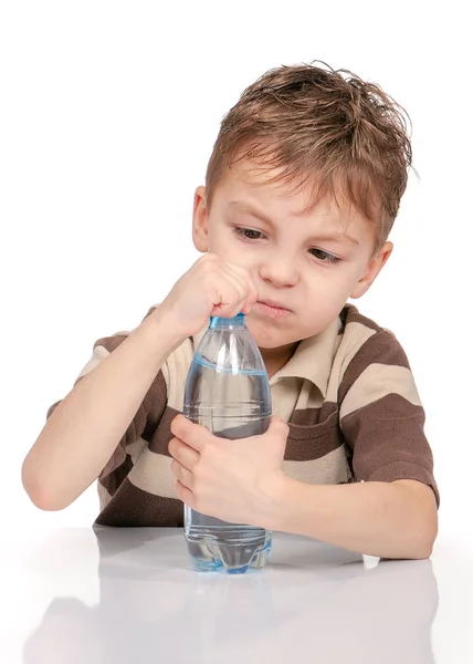 Little boy with bottle of water — Stock Photo, Image