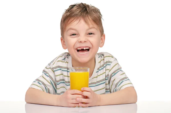 Menino com suco de laranja — Fotografia de Stock
