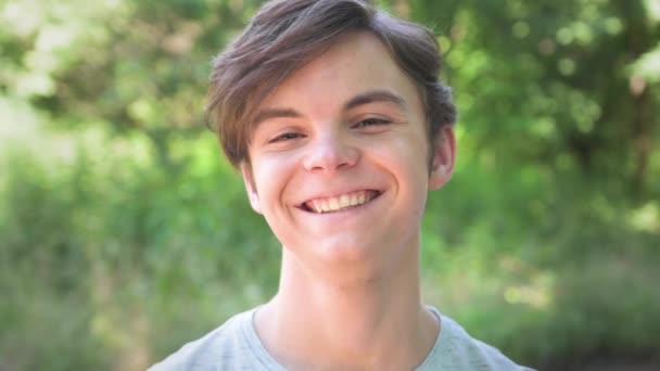 Outdoors Portrait Caucasian Teen Boy Looking Camera Smiling Cheerfully Cute — Stock Video