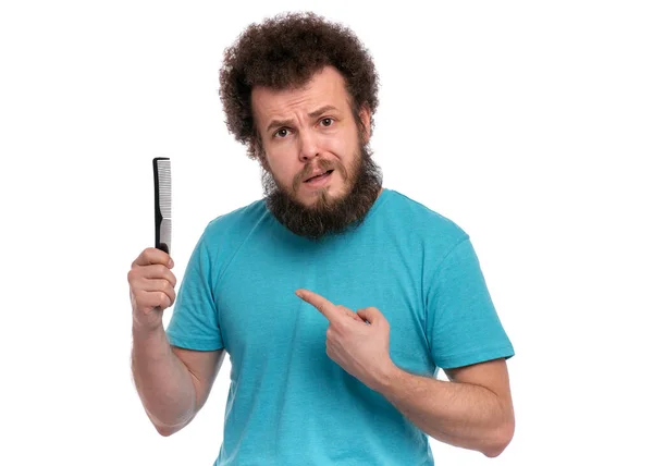 Crazy bearded man with hairbrush — Stock Photo, Image