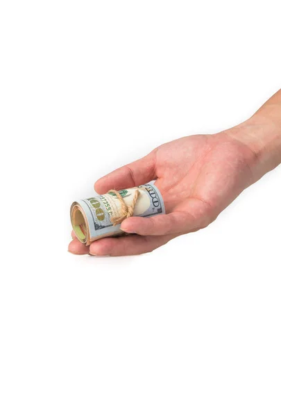 Hand holding a roll of 100 usd — Stock Photo, Image