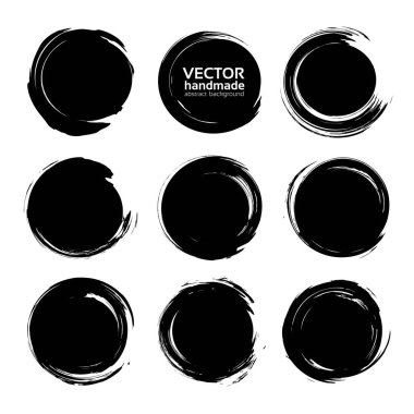 Siyah soyut yuvarlak lekeler beyaz arkaplanda izole edildi