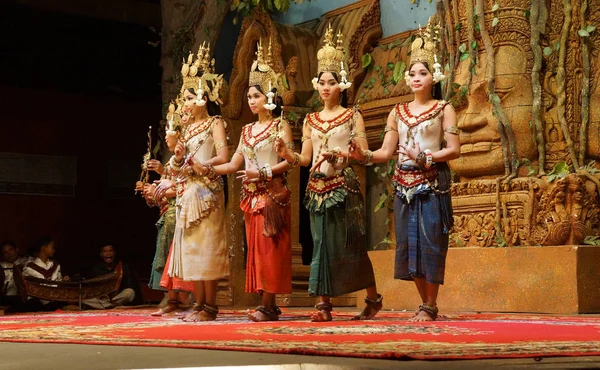 SIEM REAP, CAMBODIA - FEB 14, 2015 - Line of apsara dancers perform at a recital,  Siem Reap,  Cambodia