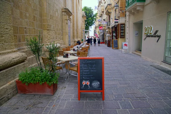 VALLETTA, MALTA - APR 10, 2018 - Menu board at outdoor restaurant in Valletta, Malta