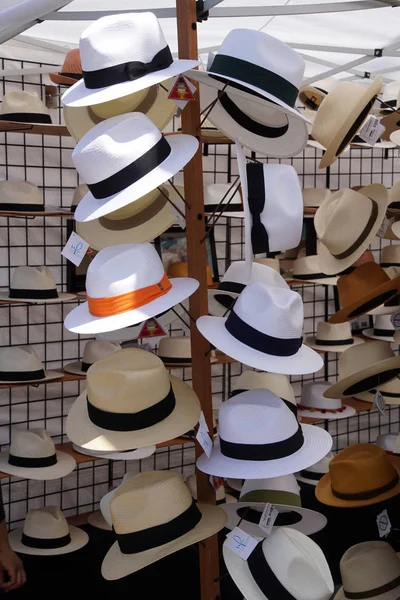 White hats for sale at  the University District Street Fair (oldest in the country),Seattle