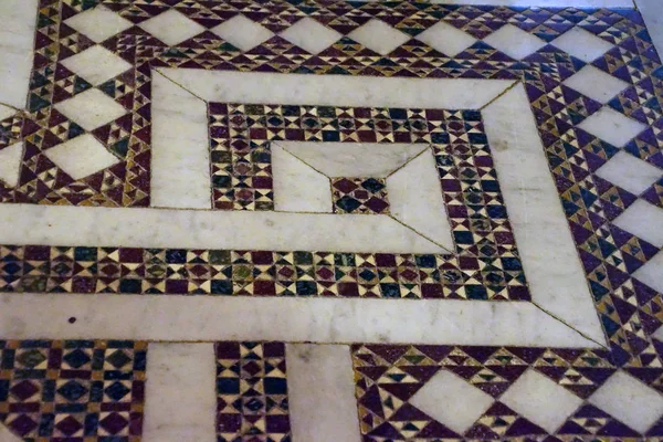 MONREALE, SICILY - NOV 28, 218 - Detail of inlaid marble Islamic patterns on floor of the  Cathredral Monreale, Sicily, Italy