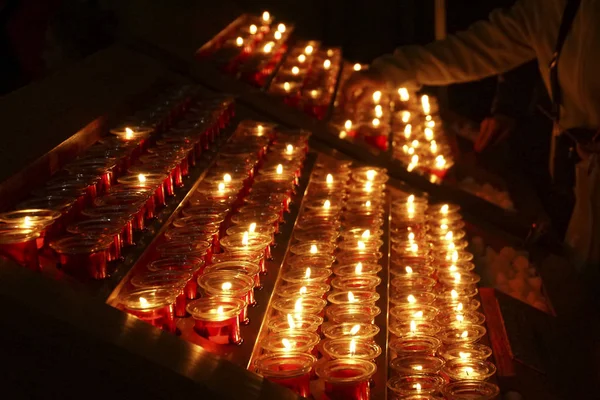 Votive candles in the Cathedral of Notre Dame, Paris, France