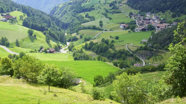 Green valley and meadows in the Dolomite alps near Castelrotto - Kastelruth, Italy