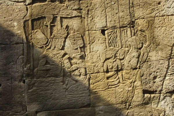 Scenes from daily life,  bas relief sculpture in Bayon, Angkor Thom,  Cambodia
