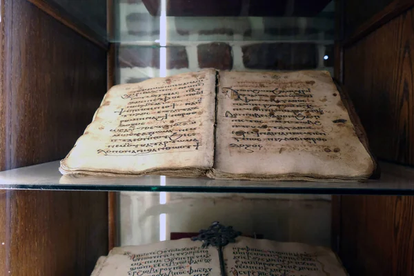 CAIRO, EGYPT - MAR 17, 2020 - Ancient religious codex in both Coptic and arabic calligraphy, Coptic Church of Martyrs Sergius and Bacchus,Cairo, Egypt