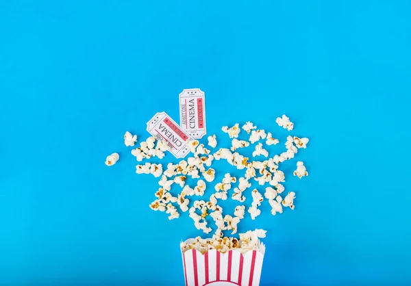 Loose Popcorn Striped Box Two Tickets Cinema Blue Background — Stock Photo, Image