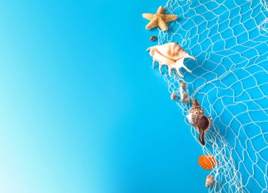 Yıldız balık, File, deniz kabukları ve kopya alanı ile yaz saati deniz tatil arka plan.