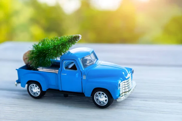 Blue Retro Toy Car Truck Delivering Christmas New Year Tree — Stock Photo, Image