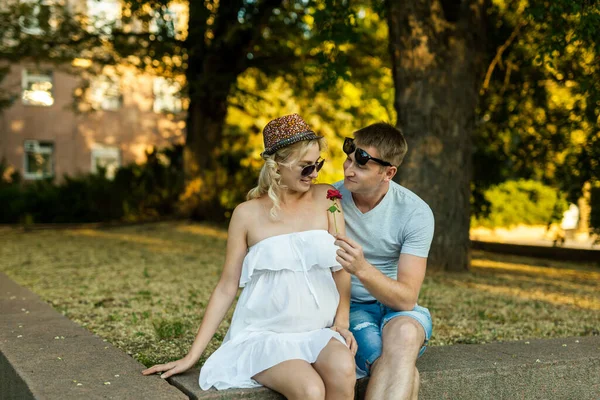 Pregnant Woman Her Husband Gently Hugging Sitting City Park Summer — Stock Photo, Image