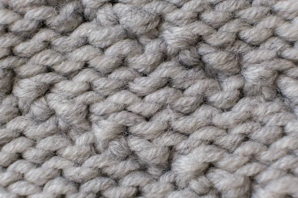 El yapımı gri örgü yün dokusu arka planı kapat, seçici odak