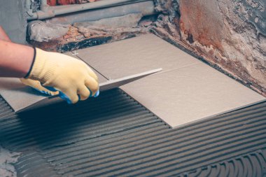 Kiremitçi karo yükleme bitirme ve işleri bakan yerde gerçekleştirir.