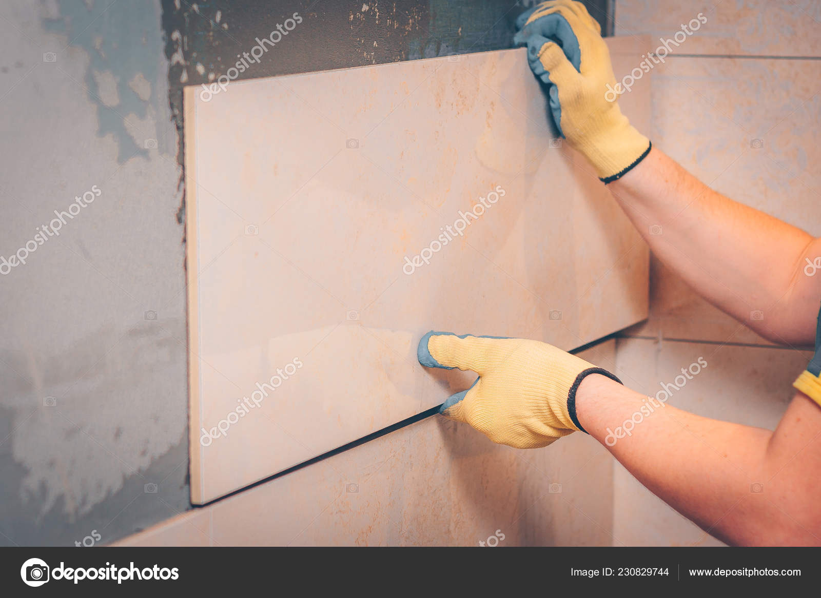 Working Tiler Puts Tiles Wall Professional Highly Skilled Technology