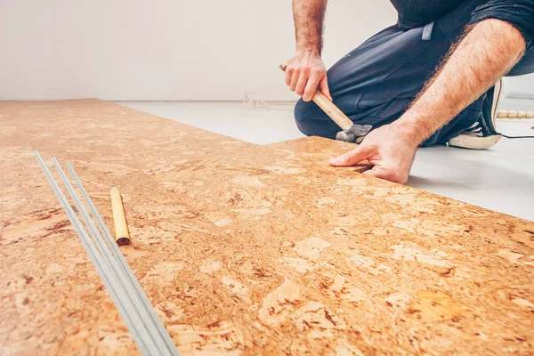 Master class for laying cork flooring, installation of a cork floor by a floating method, connection of a series of cork flooring