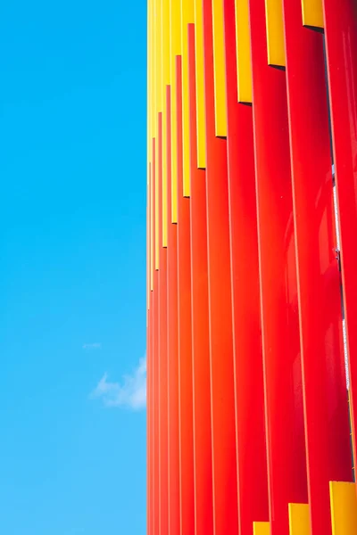 Red and yellow stripes on the sky background