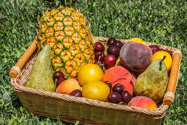 Basket Full Fruits Pear Pineapple Plum Peach Cherry — Stock Photo, Image