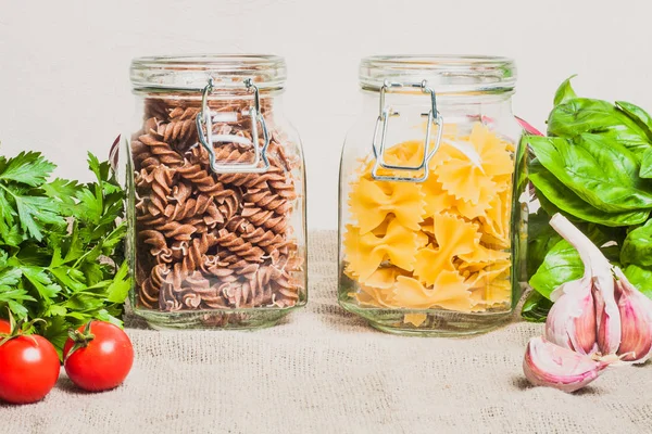 Ingredients Pasta Farfalle Fusilli Garlic Basil Cherry Tomato — Stock Photo, Image