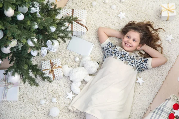 Happy Little Girl Lying Christmas Tree Gifts Carpet View — Stock Photo, Image