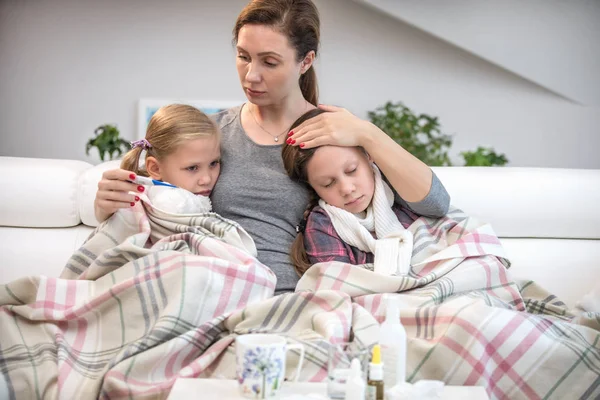 Mother Sits Couch Sick Daughters Measures Temperature — Stock Photo, Image