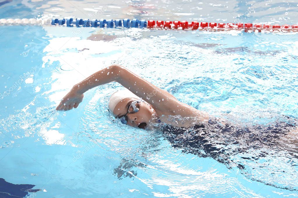 girl swimming  in pool