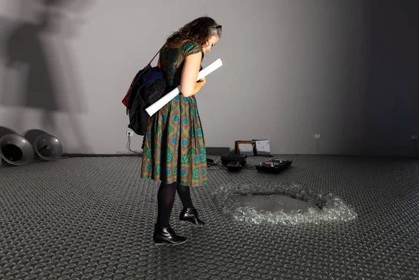 Spectator looking the Installation at the Greek Pavilion during 
