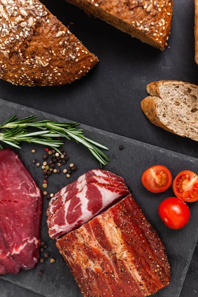 Smoked Meat Ingredients Black Stone Board Top View — Stock Photo, Image