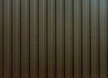 Doku olarak cıvata ile kahverengi metal çit.