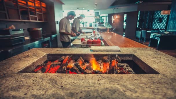 Burning firewood in restaurant kitchen interior — Stock Video