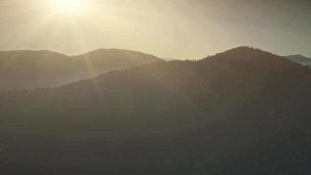 Mountain peak range sunrise soft light aerial view — Stock Video