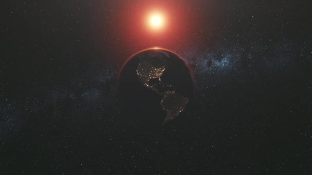 Планета Земля с освещенными материками вращается вокруг оси — стоковое видео
