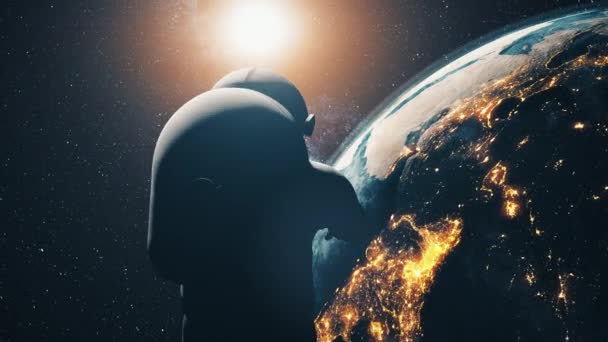 Astronauta em traje espacial sobre a Terra iluminada — Vídeo de Stock