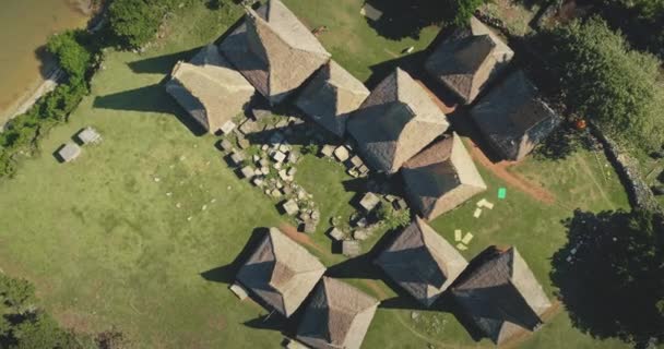 Top down of green tropic landscape at traditional houses of Kodi village, Sumba Island, Indonesia — Stock Video