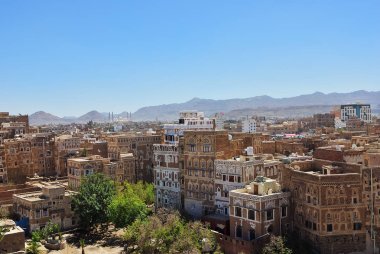 View on the old Sanaa. The old city of Sanaa is declared a UNESCO World heritage site now destroed due to civil war clipart