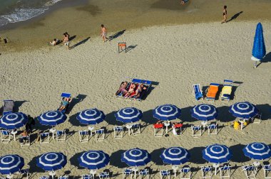 Montesilvano Pescara, Italy - July 2, 2006: View from above on a resting people on the Adriatic coastline with the beaches in Montesilvano Pescara, Abruzzo region clipart