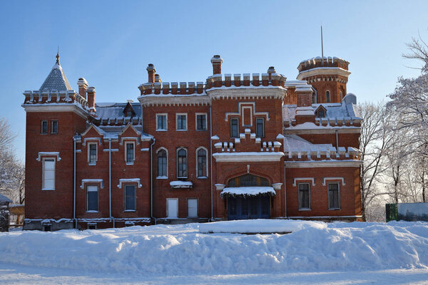 Ramon, Russia - Jan 7, 2019:  Neogotthic Oldenburg castle in winter park, Voronezh, Russia