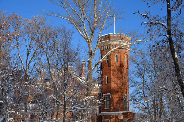 Ramon, Russia - Jan 7, 2019:  Neogotthic Oldenburg castle in winter park, Voronezh, Russia